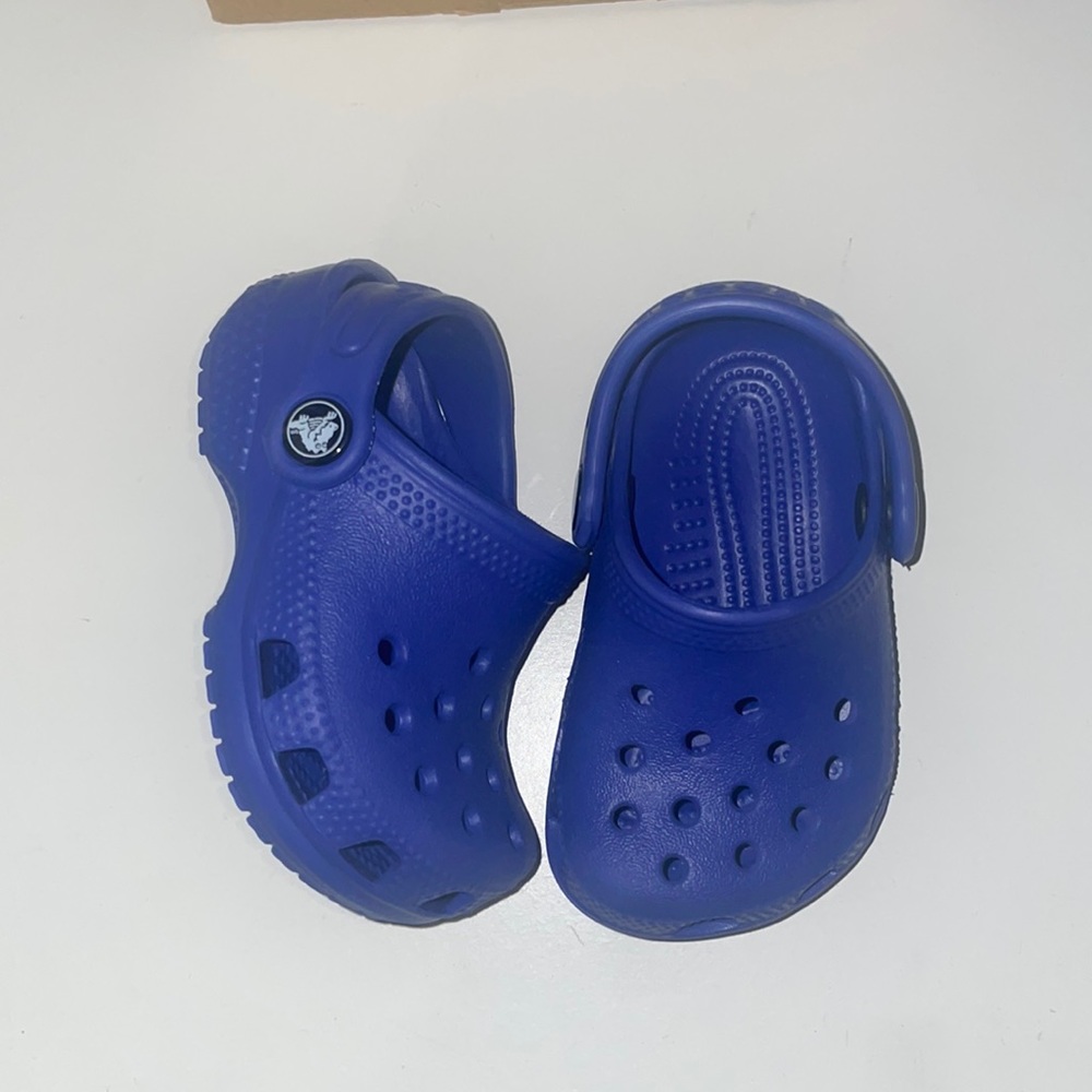 Blue Crocs size 2/3